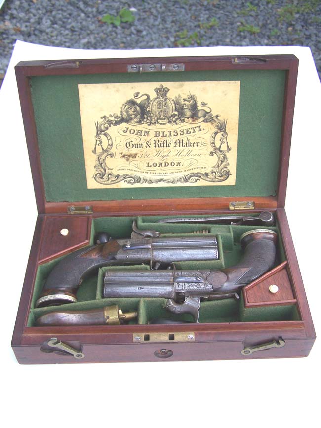 A fine Cased Pair of Over and Under Boxlock Percussion Pistols by John Blisset, London, c. 1840 — image 6